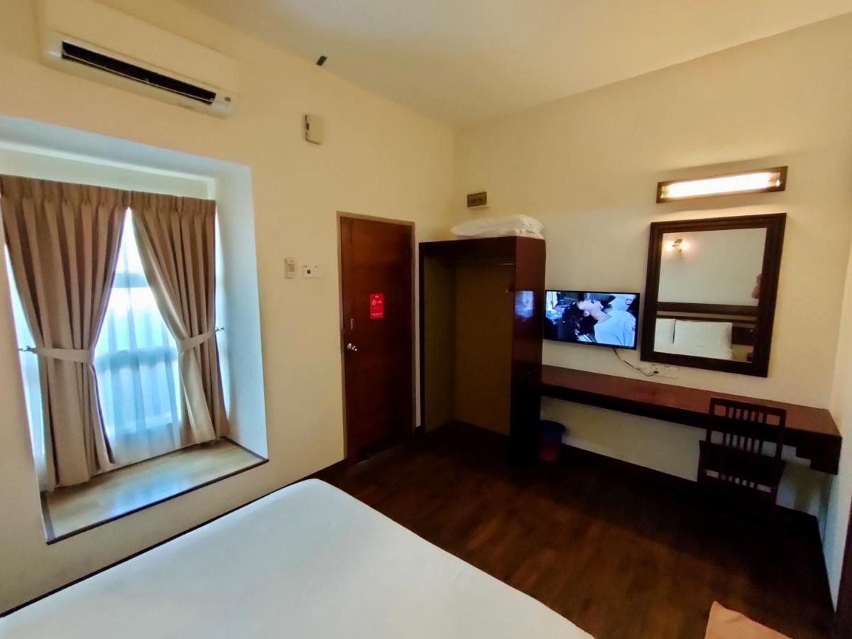Cozzy Motel Malacca Extérieur photo