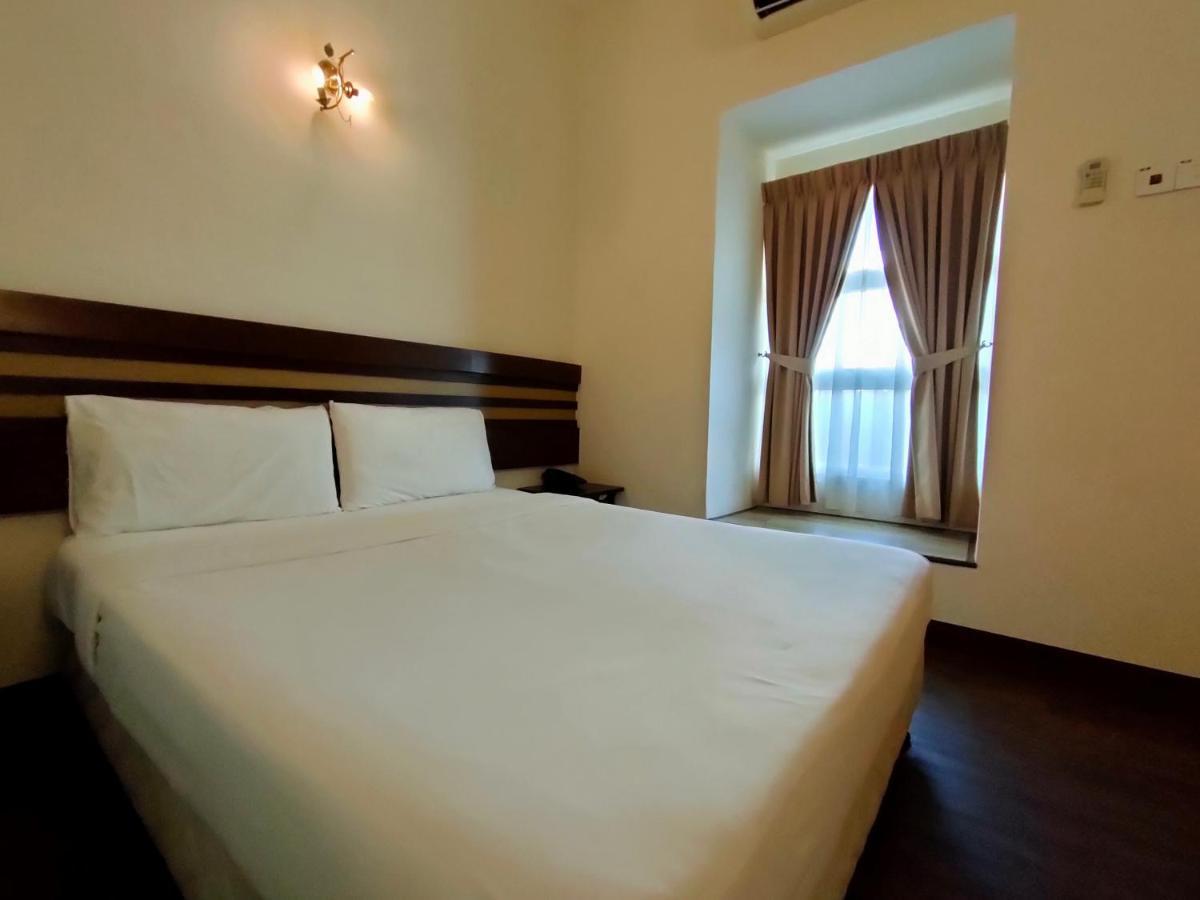 Cozzy Motel Malacca Extérieur photo