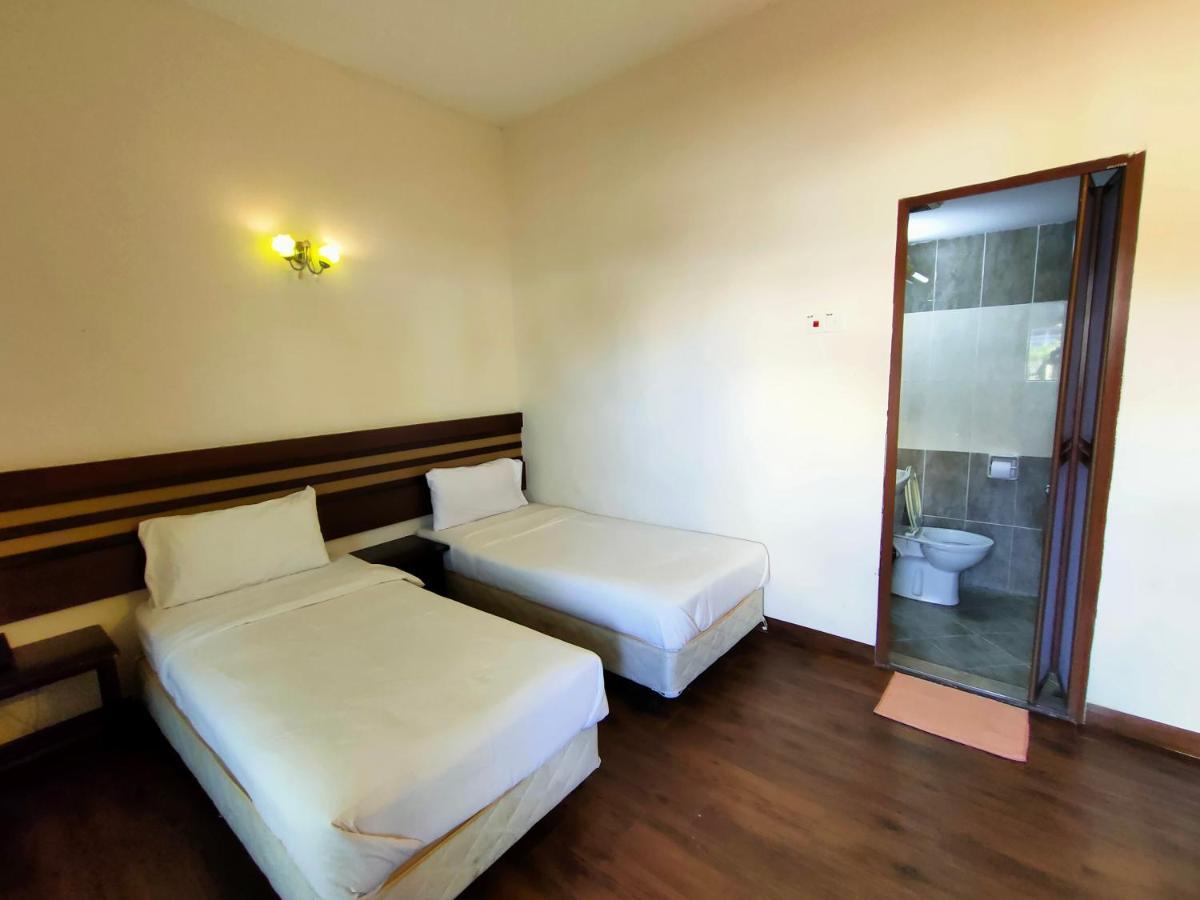 Cozzy Motel Malacca Extérieur photo