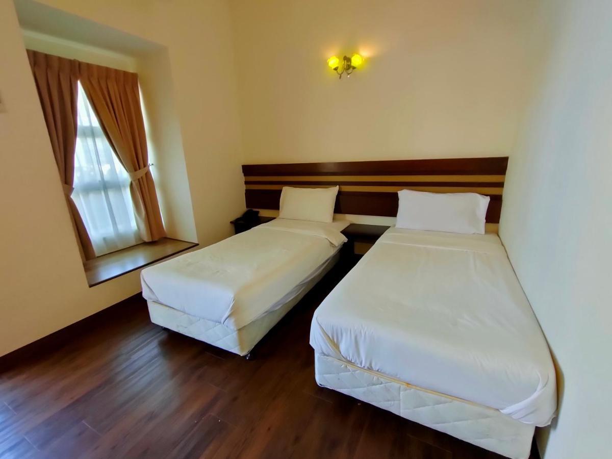 Cozzy Motel Malacca Extérieur photo
