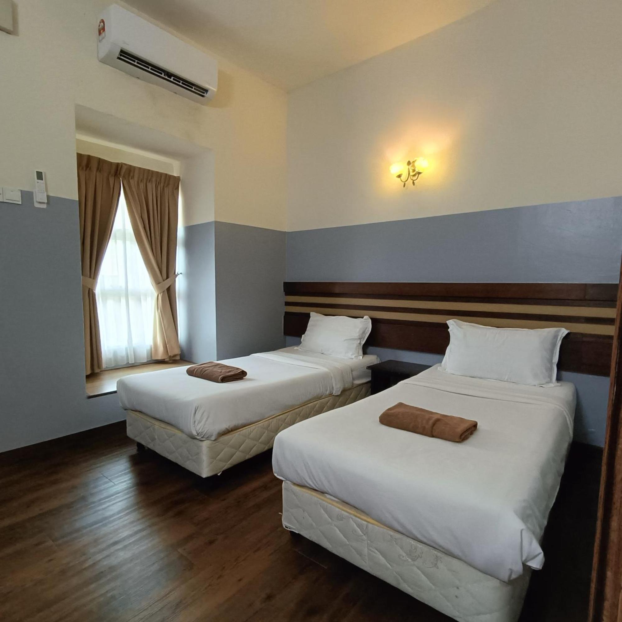 Cozzy Motel Malacca Extérieur photo